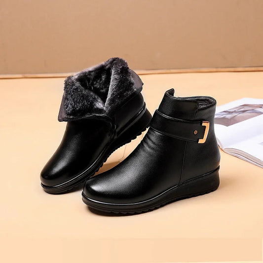 Bottes imperméables en cuir à boucle métallique pour femme