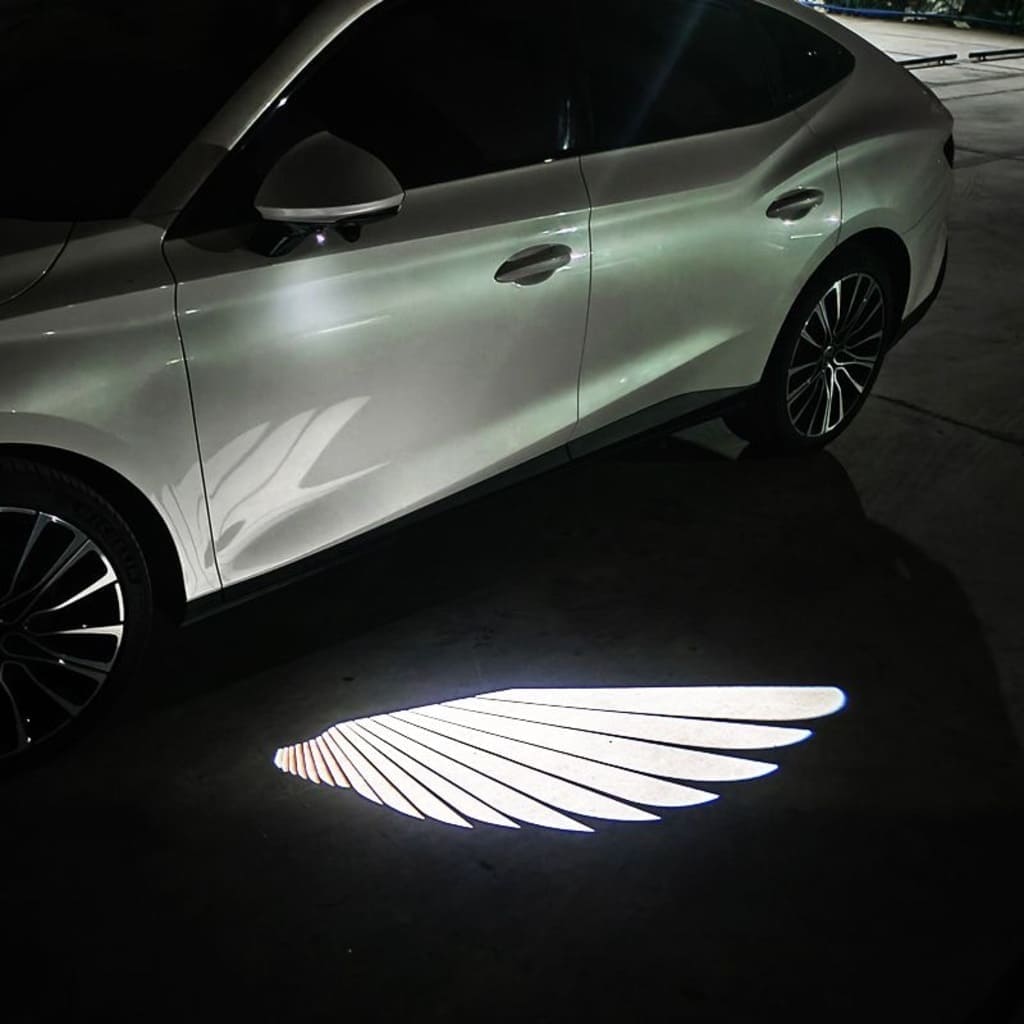 Projecteurs de sol effet « Ailes d'ange » exclusifs pour Cadillac