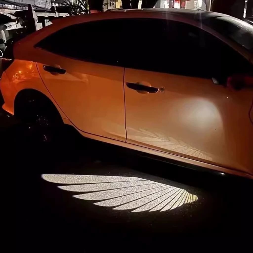 Projecteurs de sol effet « Ailes d'ange » exclusifs pour Cadillac