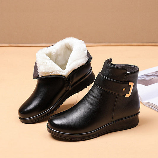 Bottes imperméables en cuir à boucle métallique pour femme